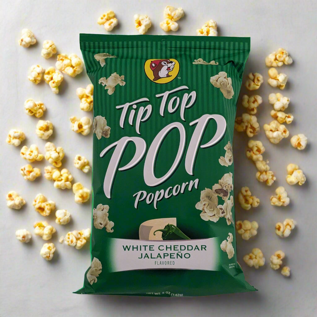 Buc-ee's Tip Top popcorn white cheddar jalapeno flavor in a dark green bag.