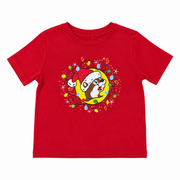 Bright red toddler short-sleeve T-shirt featuring a centered graphic of Santa Buc-ee surrounded by a ring of colorful Christmas lights.