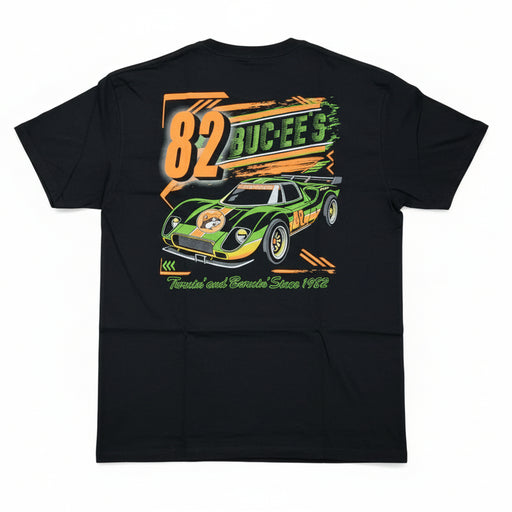 Back of black Buc-ee’s Turnin’ and Burnin’ t-shirt featuring a green race car graphic with Buc-ee’s beaver, number 82, and neon orange and green racing accents, displayed on a clean white background.