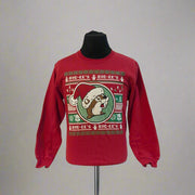 Buc-ee’s Ugly Christmas Sweater 2025 in red with Buc-ee wearing a Santa hat, surrounded by festive snowflake and reindeer sweater patterns.
