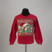 Buc-ee’s Ugly Christmas Sweater 2025 in red with Buc-ee wearing a Santa hat, surrounded by festive snowflake and reindeer sweater patterns.