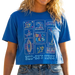 Woman wearing a blue graphic t-shirt on a beach