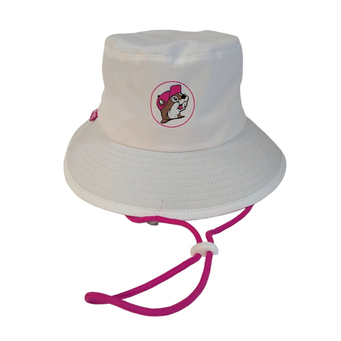 A product photo of a white Buc-ee’s bucket hat with the beaver logo featuring a pink cap, including an adjustable pink drawstring and toggle. Displayed on a clean white background.
