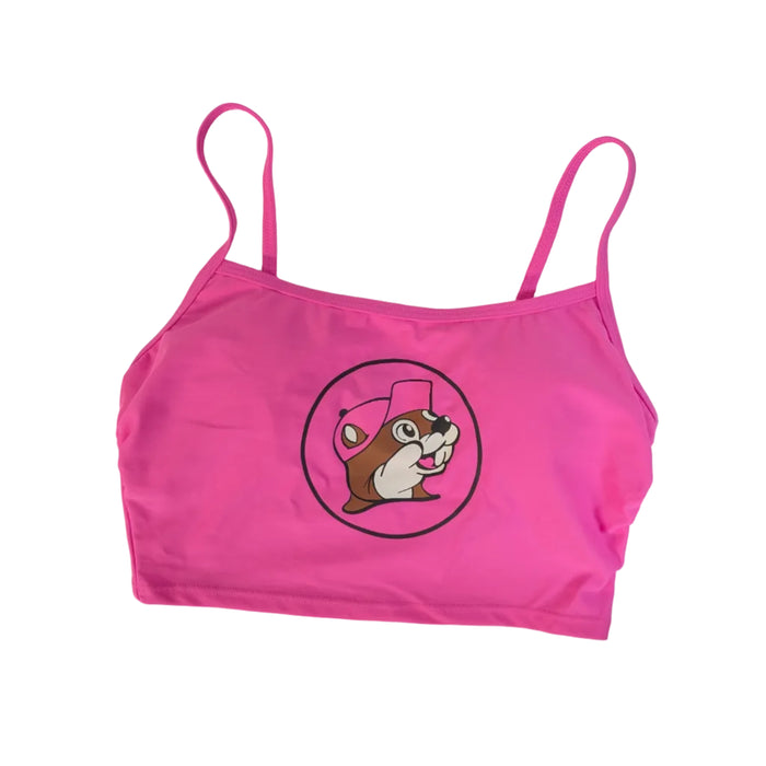 A Buc-ee's Women's Pink Logo Swim Crop Top, featuring a square neckline, thin camisole-style straps and a centered large Buc-ee beaver mascot logo wearing a pink hat, displayed on a clean white background.