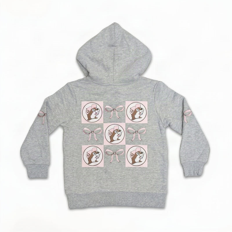 Light grey youth hoodie showing a back grid graphic of Buc-ee mascot logos alternating with pastel pink ribbon bows.