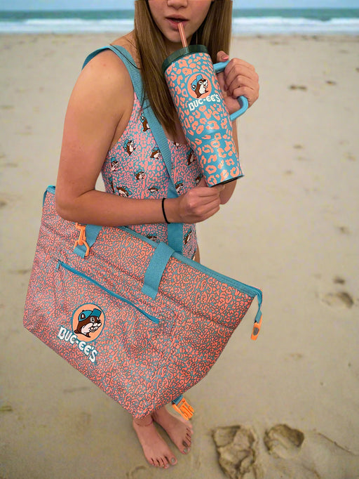 Buc-ees Leopard Items includes a swimsuit, tumbler, and cooler. 