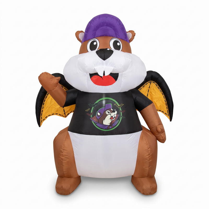 Inflatable Halloween Buc-ee's beaver mascot with purple hat, black vampire graphic shirt, and yellow bat wings waving cheerfully.
