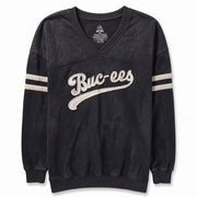 A black washed V-neck sweatshirt with 'Buc-ees' written in white script across the chest and white stripes on both sleeves, shown flat against a white background.
