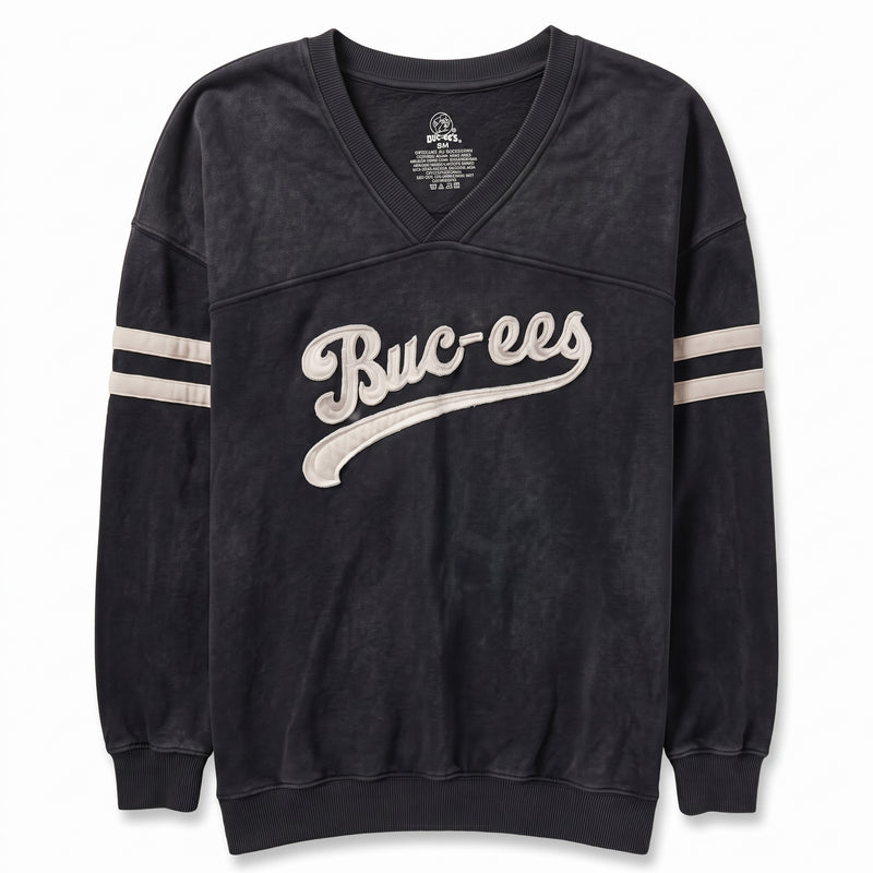 A black washed V-neck sweatshirt with 'Buc-ees' written in white script across the chest and white stripes on both sleeves, shown flat against a white background.