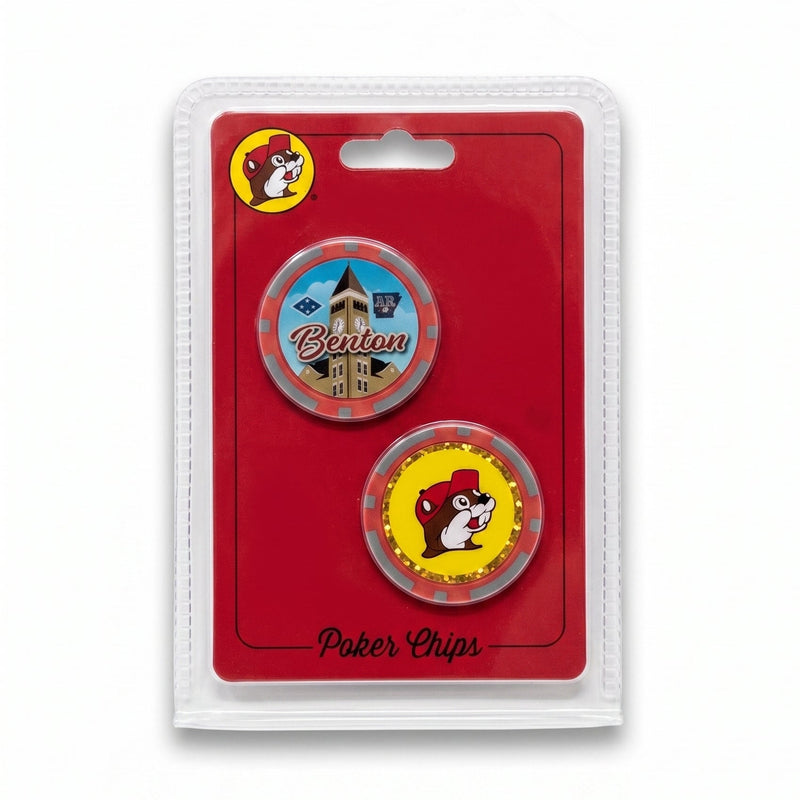 A pair of round enamel poker chips in clear plastic blister packaging on a red backing card. The top chip features the word 'Benton' with a blue and gold building illustration.