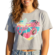 Person wearing a gray t-shirt with a colorful graphic design on a white background