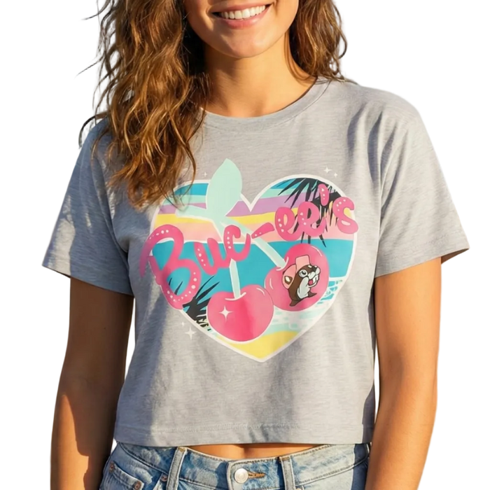 Person wearing a gray t-shirt with a colorful graphic design on a white background