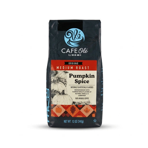 Black 12-ounce bag of H-E-B Café Olé Pumpkin Spice Medium Roast Ground Coffee with a label showing drawn pumpkins and fall-colored leaf patterns.