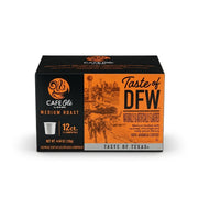 Box of H-E-B Café Olé Taste of DFW Medium Roast 12-count coffee pods with an orange label illustrating the Dallas skyline and a Texas Longhorn.
