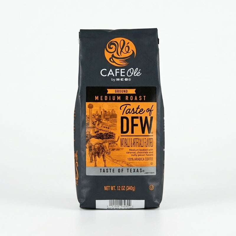 12 oz black bag of H-E-B Café Olé Taste of DFW medium roast ground coffee featuring a orange label with a Dallas skyline and longhorn illustration.
