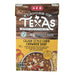 A 17-ounce carton of H-E-B "Flavors of Texas" Cajun-Style Corn Chowder Soup. The packaging features a wood-grain top with "Gluten Free" and "8g Protein" labels. The yellow bottom section displays a bowl of creamy corn chowder with red peppers and herbs.