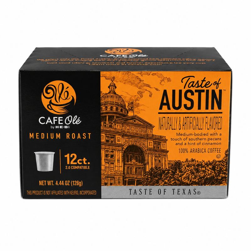 Box of H-E-B Café Olé Taste of Austin Medium Roast Coffee Pods 12 count featuring the Texas State Capitol building on orange packaging.