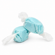 Two light blue wrapped Buc-ee's cotton candies with white plastic twist ends, arranged on a clean white background.