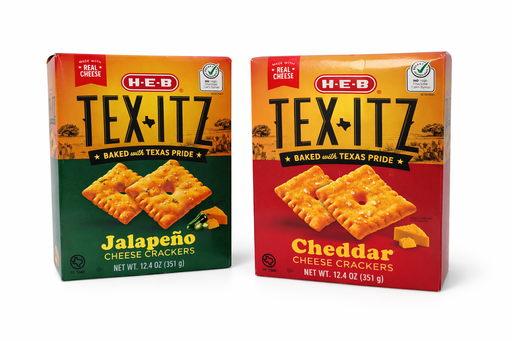 Two boxes of H-E-B TexitZ cheese crackers, one Jalapeño flavor in a green box and one Cheddar flavor in a red box, shown upright with cracker images on the front.
