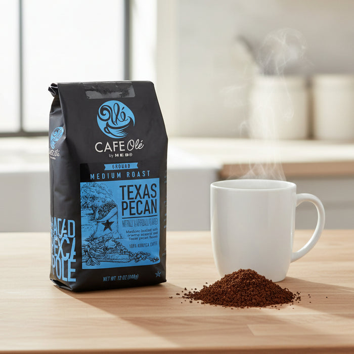 Cafe Ole Texas Pecan coffee bag on a light gray surface