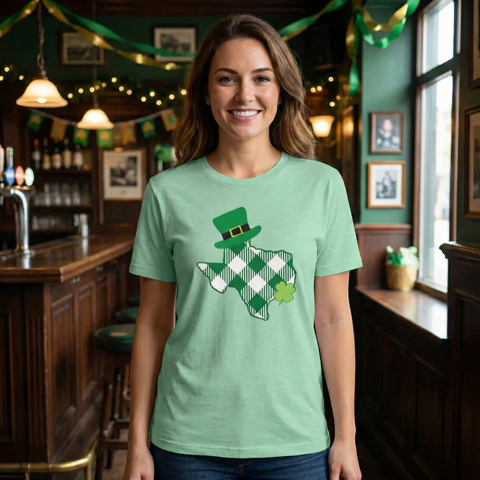 Woman wearing a green t-shirt with a graphic design in a bar setting