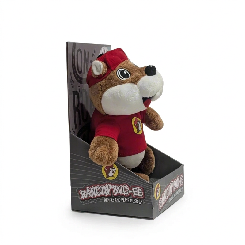 Buc-ee’s Dancin’ Buc-ee plush at an angle, showing its side profile and the open-front display box