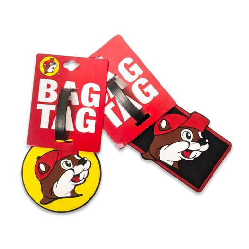Buc-ee’s bag tags in two styles, a round yellow logo tag and a rectangular black beaver tag, each with a black strap
