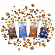 Four Buc-ee's Granola Minis flavors surrounded by granola clusters and blueberries
