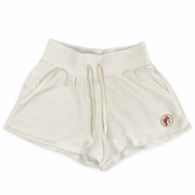 Buc-ee's Baja Fleece Shorts in cream with a wide ribbed waistband, drawstring, side pockets, and beaver logo patch