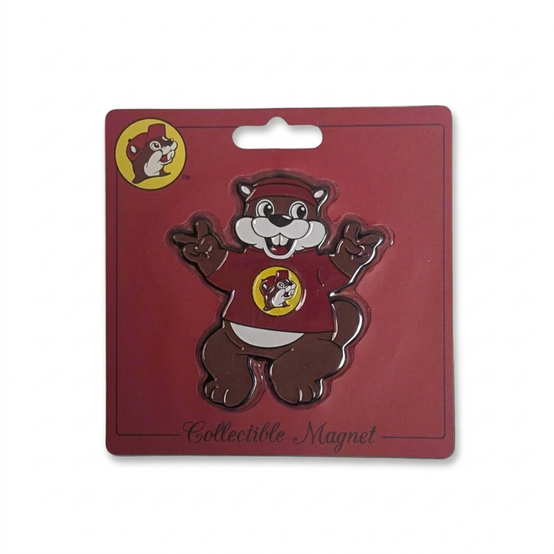 Buc-ee’s beaver collectible magnet with mascot in maroon logo shirt, arms raised, on maroon display card