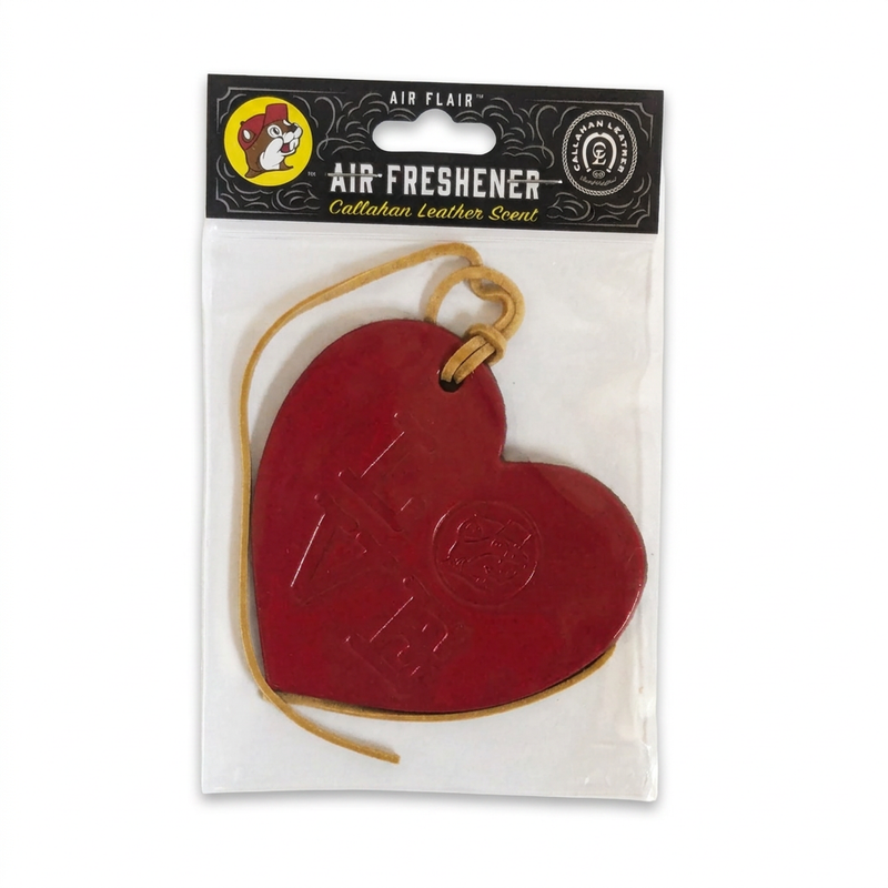 Buc-ee’s Callahan Leather Scent air freshener, a red heart embossed with LOVE and the beaver logo on a tan hanging cord