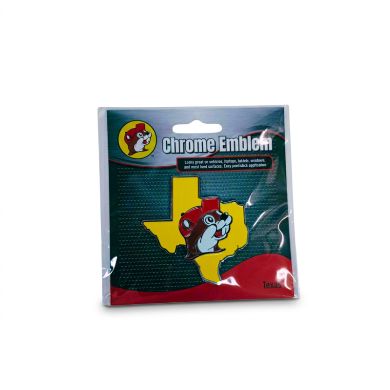 Buc-ee’s Chrome Emblem in the Texas design, a yellow Texas shape with the beaver mascot and chrome edging, in packaging