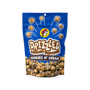 Bag of Buc-ee's Drizzled Caramel Popcorn in Cookies N' Cream flavor, front view on white