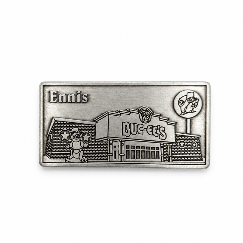 Antique silver Buc-ee's Ennis storefront metal magnet with store and sign relief, on white