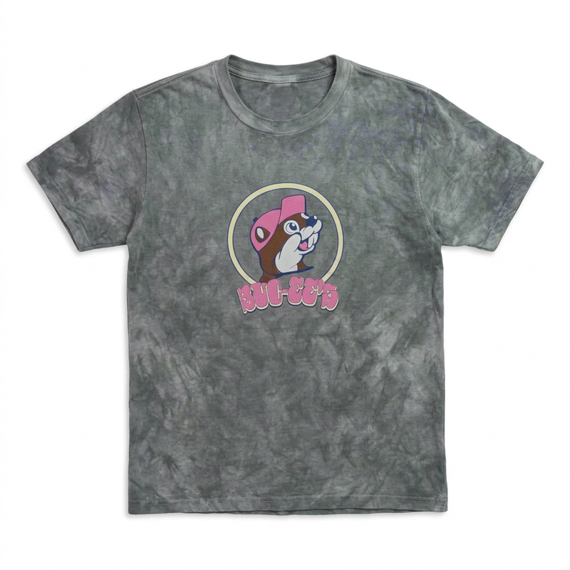 “In My Buc-ee’s Era” shirt in gray cloud wash, front view with beaver in a pink cap above pink bubble-letter logo