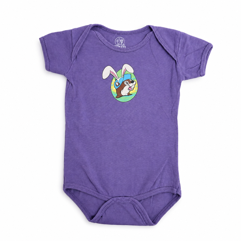 Buc-ee’s infant Easter bodysuit in purple with bunny-eared beaver logo in an Easter egg, envelope neck, and snap closure