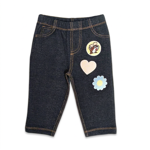 Buc-ee’s infant jeans in dark wash with elastic waist and beaver, pink heart, and blue daisy patches down one leg