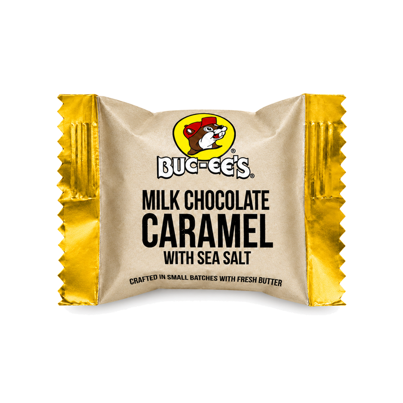 Buc-ee's small-batch Milk Chocolate Caramel with Sea Salt, individually wrapped in kraft paper with gold foil ends
