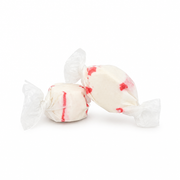Buc-ee's Peppermint Saltwater Taffy, two white pieces with red stripes in clear twist wrappers, from the 12 oz bag
