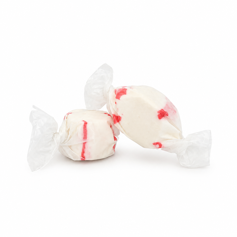 Buc-ee's Peppermint Saltwater Taffy, two white pieces with red stripes in clear twist wrappers, from the 12 oz bag