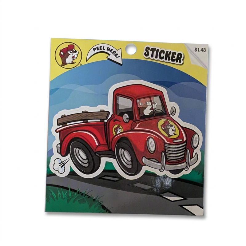 Buc-ee’s red pickup truck die-cut sticker with a beaver driving a vintage truck, on a peel-here backing card