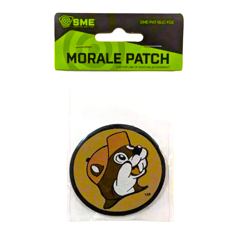 Buc-ee’s tan logo morale patch, a round beaver design with black border, in SME Morale Patch retail packaging