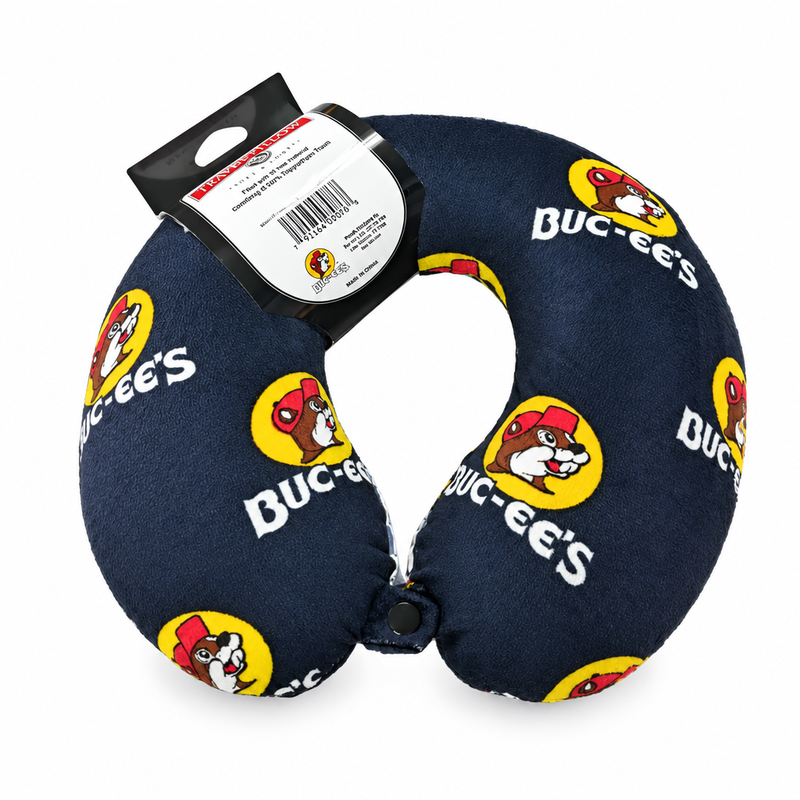 Buc-ee's travel neck pillow in navy plush with an all-over beaver logo print, U-shaped design, and front snap closure