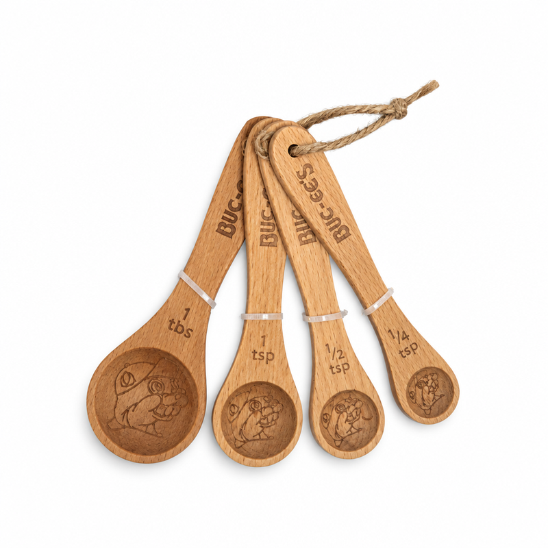 Buc-ee's 4-piece wooden measuring spoon set, 1 tbsp to 1/4 tsp, with engraved beaver mascot bowls and tied with a twine loop