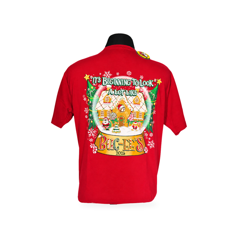 Back of red 2023 Buc-ee's Christmas shirt with gingerbread house snow globe and "It's Beginning to Look a Lot Like Buc-ee's"