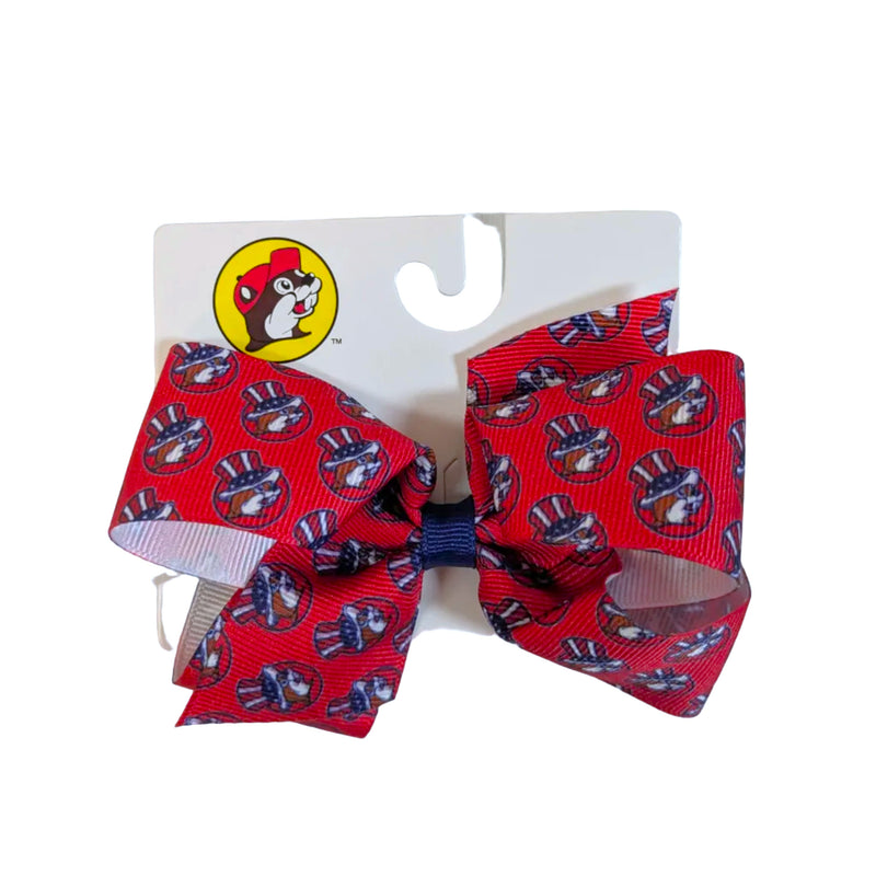 Buc-ee’s 4th of July hair bow, king size, in red with a print of the beaver mascot in a stars and stripes top hat