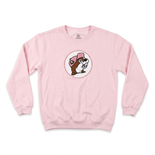 Buc-ee’s adult pink crewneck sweatshirt with a fuzzy chenille beaver logo patch in a white circle on the chest and ribbed cuffs
