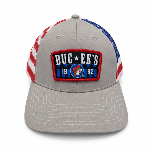 Buc-ee's America trucker hat in gray with stars and stripes mesh panels and a red-trimmed 1982 beaver logo patch, front view