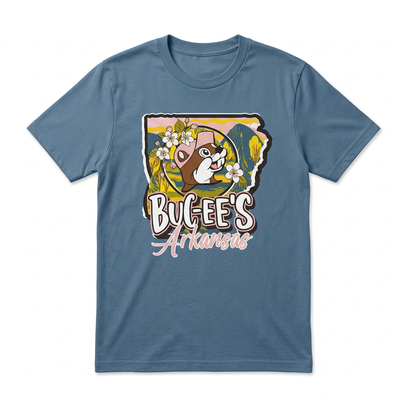 Buc-ee’s Arkansas Blossoms teal tee with a state-shaped graphic of the beaver, white blossoms, mountains, and pink script