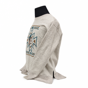 Side view of the Buc-ee's Aztec Fleece Sweater Tunic showing the side hem slit, dropped shoulder, and ribbed cuffs